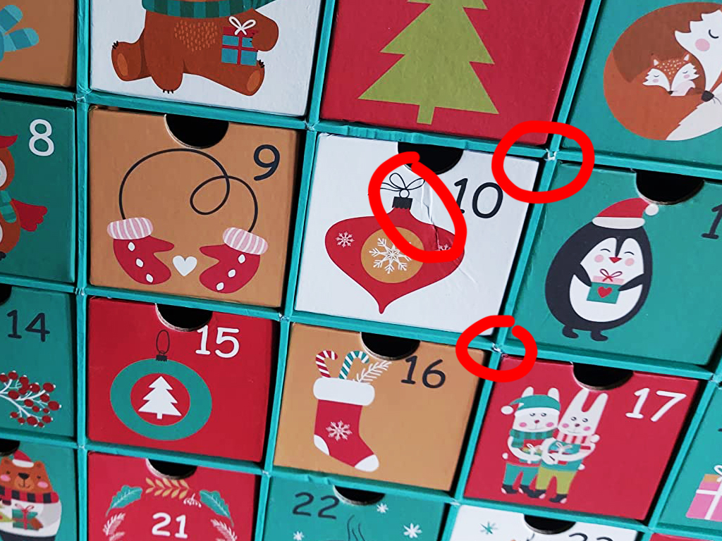 Adventskalender: Hier ein Beispiel, habe Rot umkreist, hat aber trotzdem sehr lange gehalten. Aber das kann man auch optisch mit was abkleben.